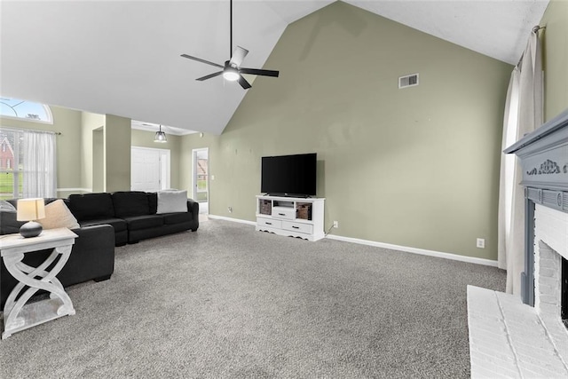 3625 Wapakonata Trl, Bethlehem, GA 30620 - carpeted living room featuring high vaulted ceiling, a brick fireplace, ceiling fan, baseboards, and healthy amount of natural light