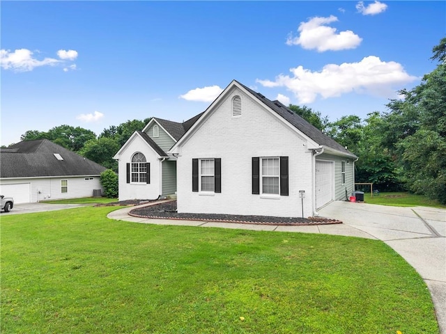 3625 Wapakonata Trl, Bethlehem, GA 30620 - view of front of home featuring concrete driveway, brick siding, a front lawn, and a garage