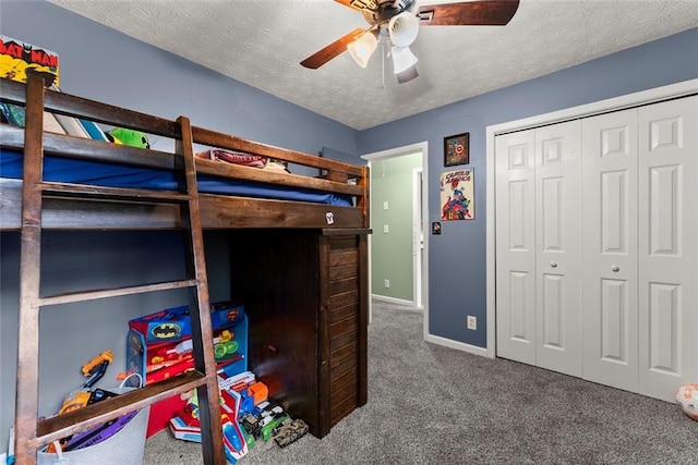 3625 Wapakonata Trl, Bethlehem, GA 30620 - bedroom with carpet, a textured ceiling, a closet, baseboards, and ceiling fan