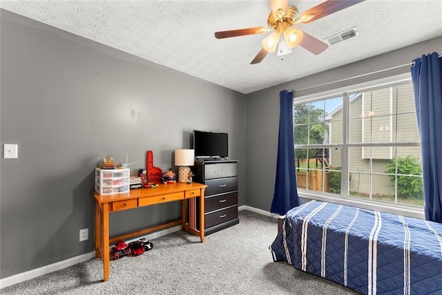 3625 Wapakonata Trl, Bethlehem, GA 30620 - carpeted bedroom with a textured ceiling, baseboards, and a ceiling fan