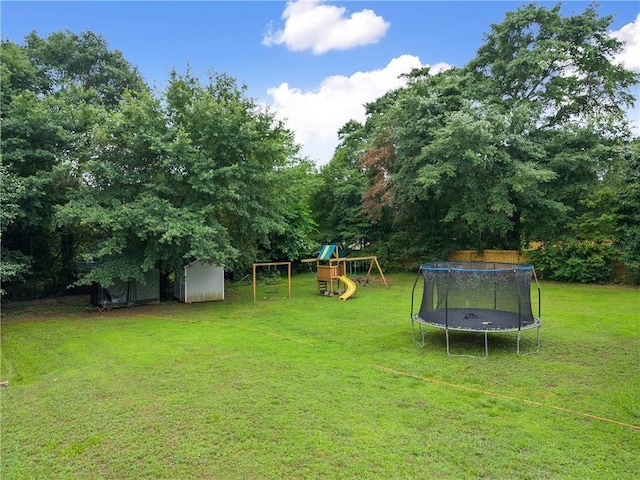 3625 Wapakonata Trl, Bethlehem, GA 30620 - view of green lawn featuring a trampoline and a playground