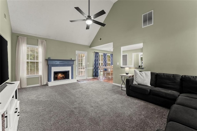 3625 Wapakonata Trl, Bethlehem, GA 30620 - carpeted living area with a ceiling fan, high vaulted ceiling, a brick fireplace, and baseboards