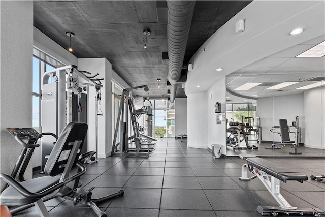 exercise room with baseboards