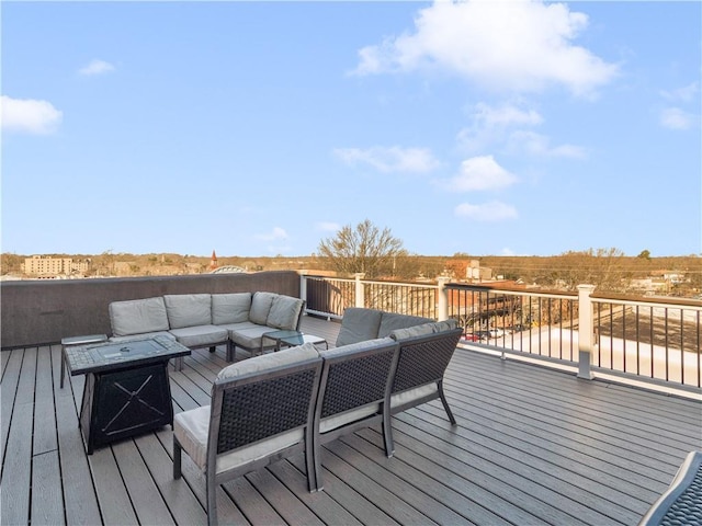 wooden deck featuring an outdoor hangout area