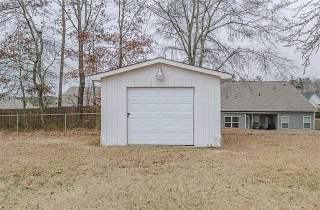 garage with a yard