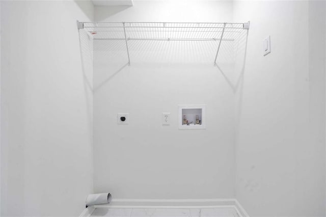 washroom featuring hookup for a washing machine and electric dryer hookup