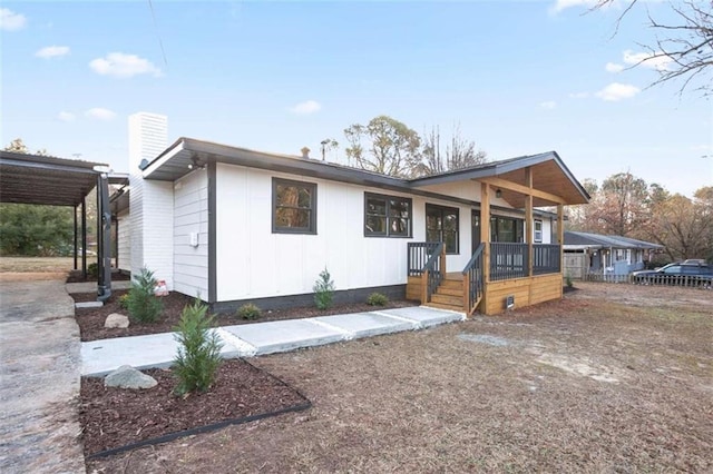 view of front of home featuring covered porch