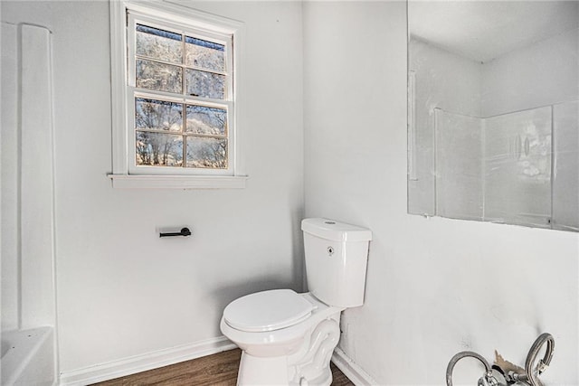 7935 Sweetwater Dr, Douglasville, GA 30135 - bathroom with wood finished floors, a bathtub, and a shower