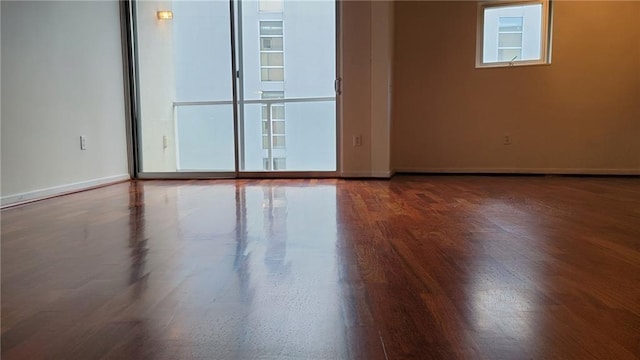 620 Glen Iris Dr NE Unit 321, Atlanta, GA 30308 - unfurnished room featuring baseboards and wood finished floors