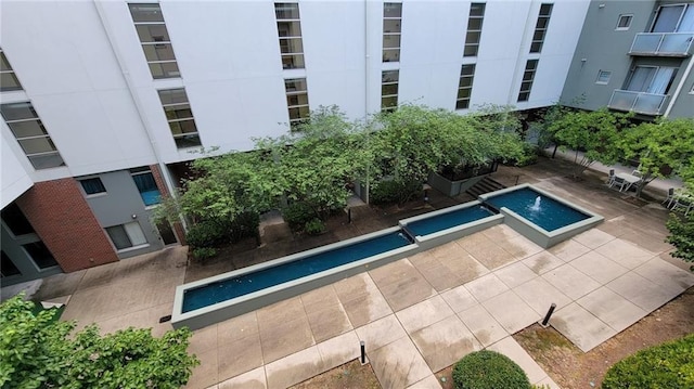 620 Glen Iris Dr NE Unit 321, Atlanta, GA 30308 - outdoor pool with a patio
