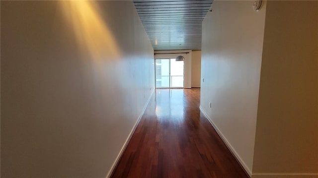 620 Glen Iris Dr NE Unit 321, Atlanta, GA 30308 - hall with baseboards and dark wood finished floors