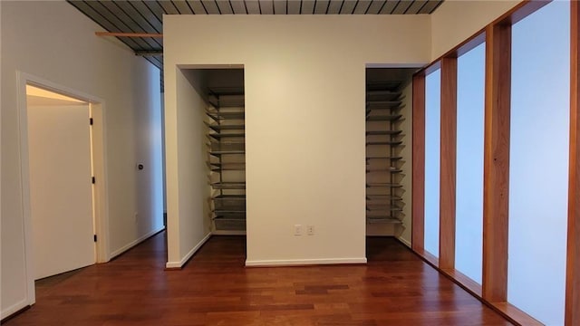 620 Glen Iris Dr NE Unit 321, Atlanta, GA 30308 - unfurnished bedroom featuring wood finished floors and baseboards