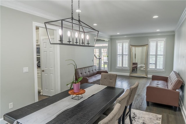 4569 Campenille Trce, Suwanee, GA 30024 - dining room with crown molding, wood finished floors, recessed lighting, and a chandelier
