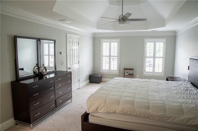 4569 Campenille Trce, Suwanee, GA 30024 - bedroom featuring light colored carpet, a tray ceiling, ornamental molding, and a ceiling fan