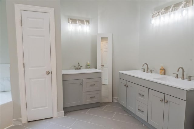 4569 Campenille Trce, Suwanee, GA 30024 - full bathroom with double vanity, tile patterned floors, and a bath