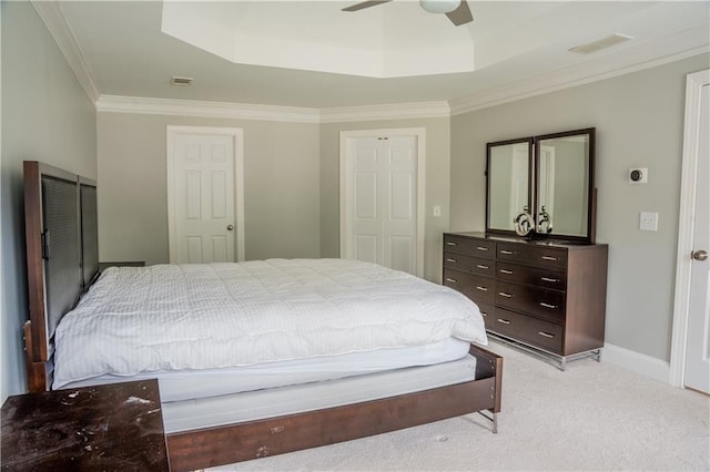 4569 Campenille Trce, Suwanee, GA 30024 - bedroom featuring a raised ceiling, crown molding, light carpet, and a ceiling fan