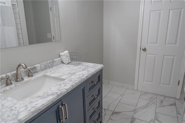 4569 Campenille Trce, Suwanee, GA 30024 - bathroom featuring vanity and marble look tile flooring