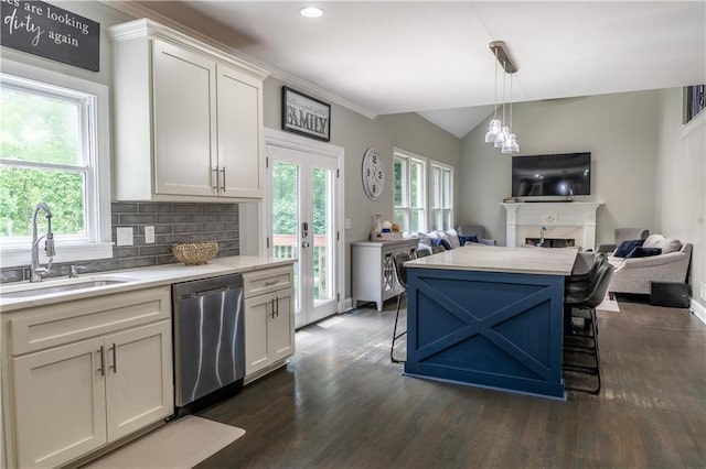 4569 Campenille Trce, Suwanee, GA 30024 - kitchen featuring dishwasher, open floor plan, light countertops, dark wood-style flooring, and vaulted ceiling