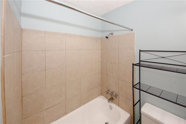 full bath featuring toilet and washtub / shower combination