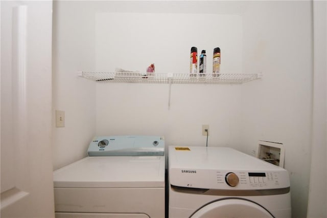 laundry area with washer and clothes dryer