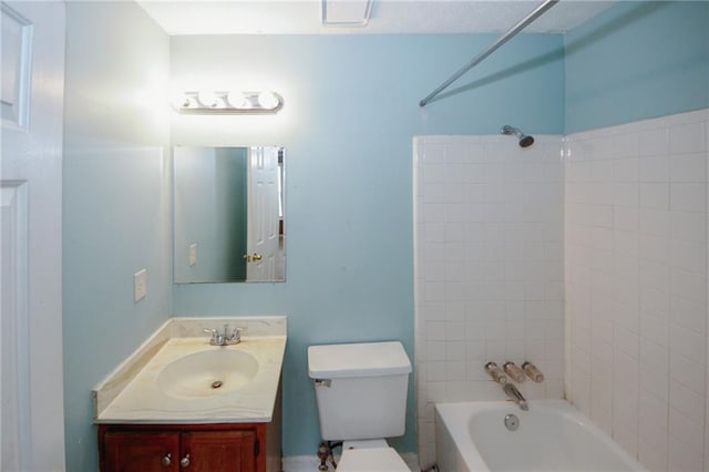 full bath with bathing tub / shower combination, toilet, and vanity