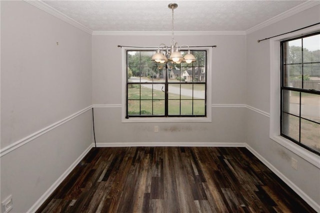 unfurnished dining area featuring a chandelier, plenty of natural light, wood finished floors, baseboards, and a textured ceiling