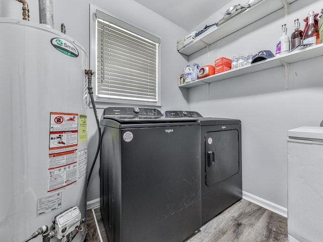 464 Mason Dr, Canton, GA 30115 - laundry area with gas water heater, washer and dryer, wood finished floors, and baseboards