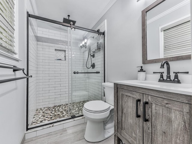 464 Mason Dr, Canton, GA 30115 - bathroom with ornamental molding, toilet, a shower stall, and vanity