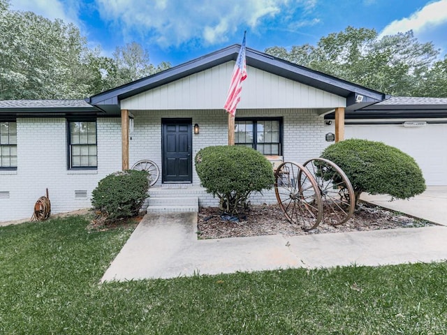 464 Mason Dr, Canton, GA 30115 - view of front of house featuring brick siding, a garage, covered porch, and a front yard