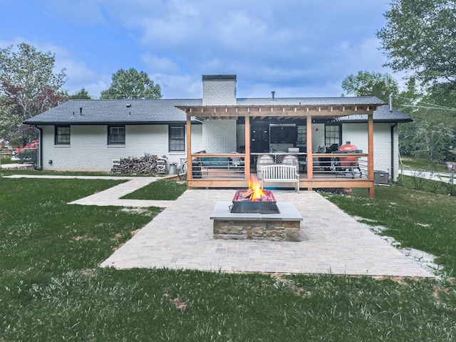 464 Mason Dr, Canton, GA 30115 - back of property with a fire pit, a pergola, a patio, and a yard
