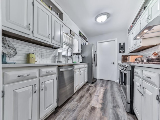 464 Mason Dr, Canton, GA 30115 - kitchen with stainless steel appliances, under cabinet range hood, tasteful backsplash, wood finished floors, and white cabinets