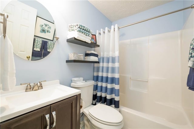 2305 Keenland Ct, Cumming, GA 30040 - bathroom with toilet, shower / bath combo with shower curtain, vanity, and a textured ceiling