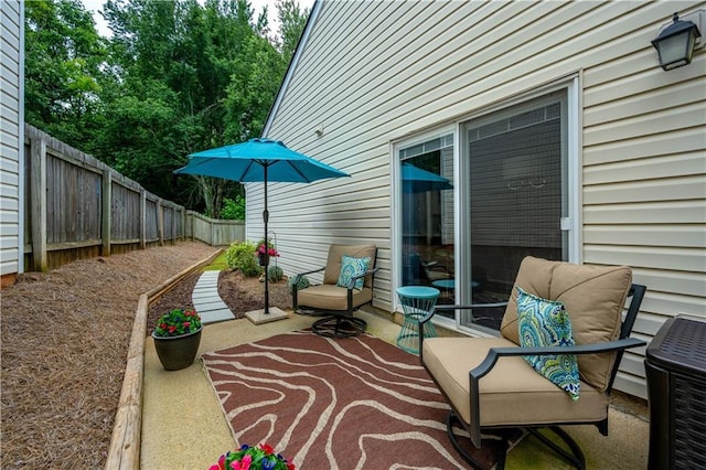 2305 Keenland Ct, Cumming, GA 30040 - fenced backyard with a patio area