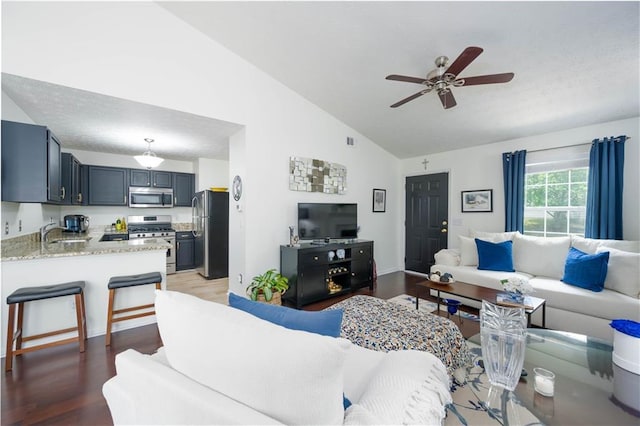 2305 Keenland Ct, Cumming, GA 30040 - living area featuring vaulted ceiling, light wood-style flooring, and ceiling fan