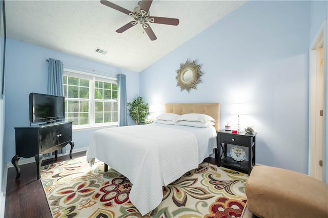 2305 Keenland Ct, Cumming, GA 30040 - bedroom featuring lofted ceiling, a ceiling fan, and wood finished floors
