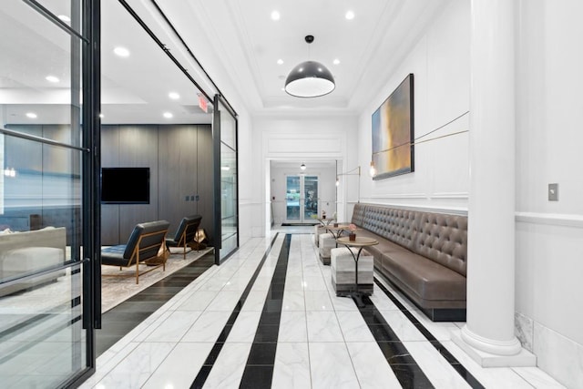 lobby featuring recessed lighting and crown molding