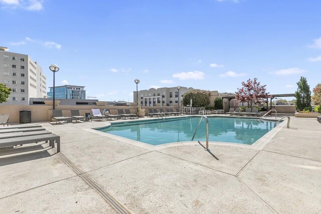 community pool featuring a patio