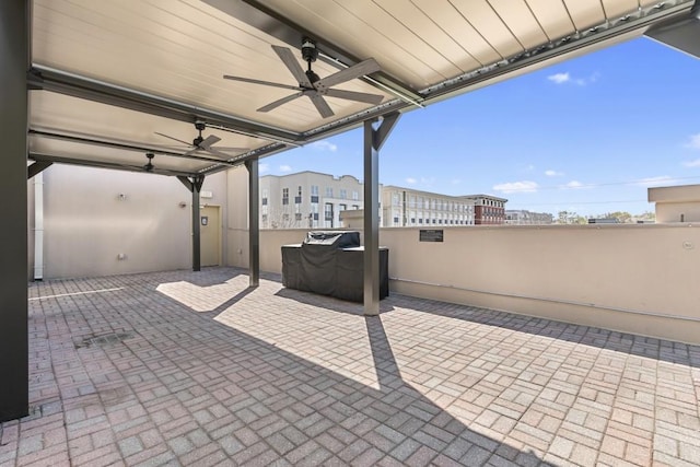 view of patio / terrace featuring a ceiling fan