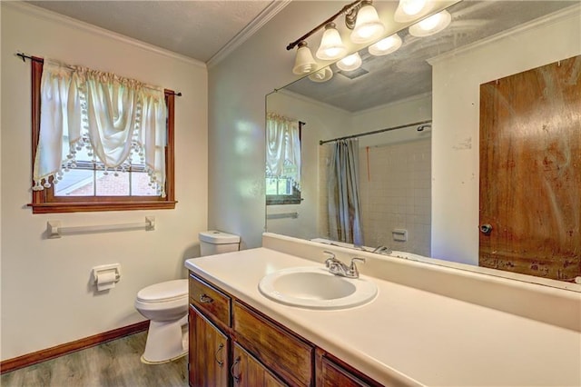bathroom with a shower with curtain, toilet, baseboards, wood finished floors, and ornamental molding