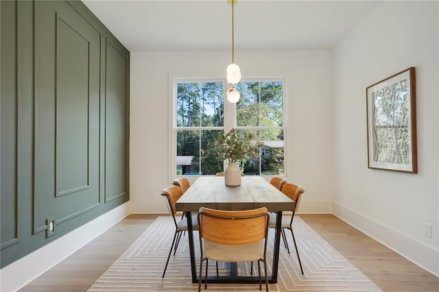 dining area with light wood-type flooring