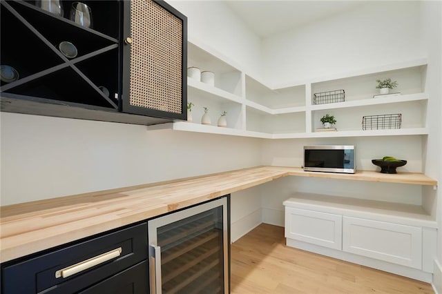 pantry featuring beverage cooler