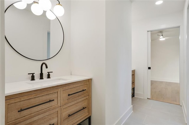 bathroom with tile patterned flooring and vanity