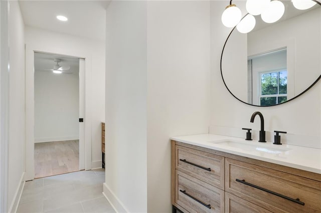 bathroom featuring tile patterned flooring and vanity