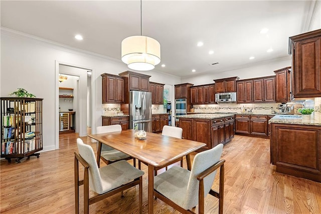 2317 Whiting Bay Cts NW, Kennesaw, GA 30152 - dining area featuring ornamental molding, light wood-style floors, and recessed lighting