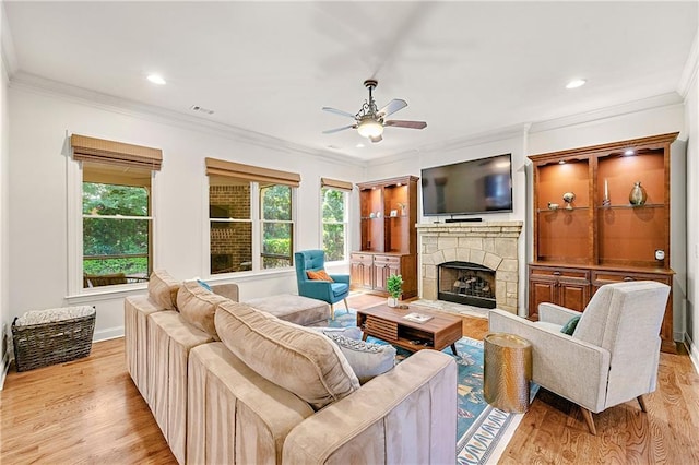 2317 Whiting Bay Cts NW, Kennesaw, GA 30152 - living room with a ceiling fan, light wood-style floors, ornamental molding, a fireplace, and recessed lighting