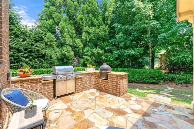 2317 Whiting Bay Cts NW, Kennesaw, GA 30152 - view of patio featuring exterior kitchen