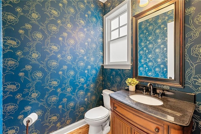 2317 Whiting Bay Cts NW, Kennesaw, GA 30152 - half bathroom with wallpapered walls and vanity