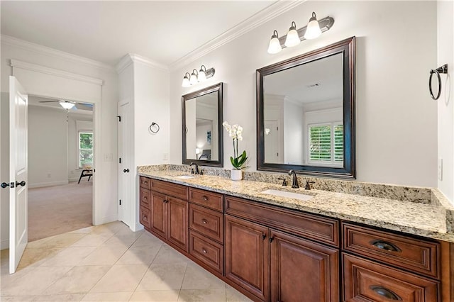 2317 Whiting Bay Cts NW, Kennesaw, GA 30152 - full bath featuring double vanity, healthy amount of natural light, crown molding, tile patterned flooring, and ceiling fan