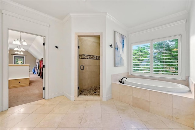 2317 Whiting Bay Cts NW, Kennesaw, GA 30152 - full bathroom with a shower stall, a bath, tile patterned flooring, a chandelier, and ornamental molding