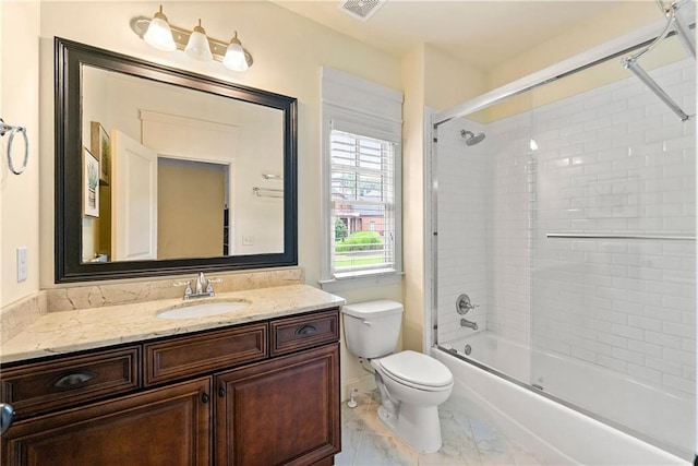 2317 Whiting Bay Cts NW, Kennesaw, GA 30152 - full bathroom featuring vanity, bath / shower combo with glass door, and marble look tiles
